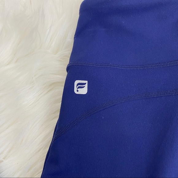 Fabletics Navy Mid-Rise Pureluxe Capri Leggings - Picture 4 of 7